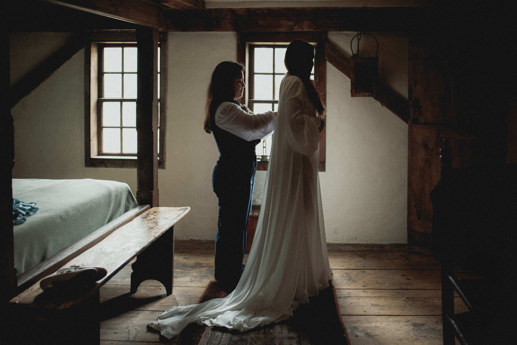 Two Brides getting ready at a 17th century Inn in the historical Gloucester Massachusetts on their elopement day